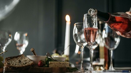 Glasses set on a banquet table alongside carefully curated pairings