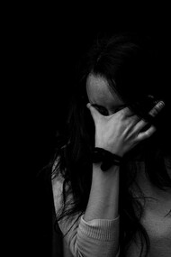 Photography of woman touching her eyes