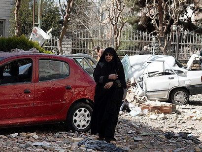 Ruins cover a residential area in Tehran after the attack, Iran