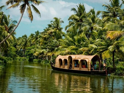 A cloudy day over the serene backwaters of Alappuzha in Kerala, often called God’s Own Country, India