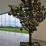 Nari Ward, Land, 2002-present, Metal, wood, parachute materials, barrier cloth, used wheels, and audio elements, 197 x 39-3/8 x 157-1/2 inches, Installation view: Nerman Museum of Contemporary Art, Overland Park, Kansas, Image courtesy the artist and Lehmann Maupin, New York, and Hong Kong