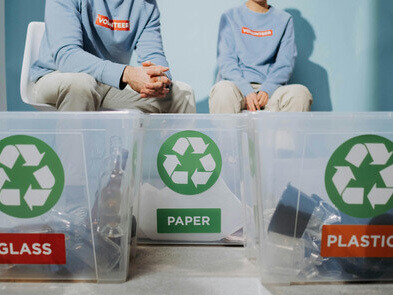 Sorting waste into boxes highlights the role of smart waste management in sustainable urban living