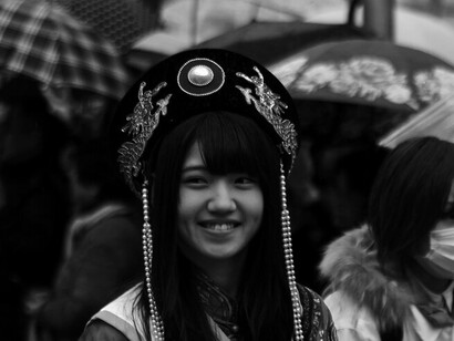 Radiating joy and elegance, this beautiful participant embodies the spirit of the Nagasaki Lantern Festival in Nagasaki, Japan, a celebration where tradition and culture come alive