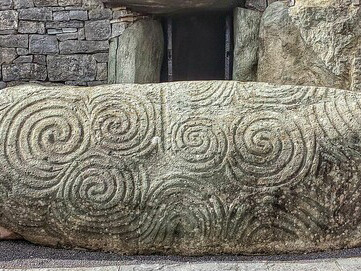 A carved stone can be found on the rear outer wall of the Newgrange Tomb in Ireland