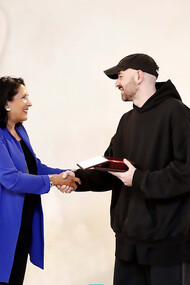 Georgian President Salome Zourabichvili awarding designer Demna Gvasalia, 2021
