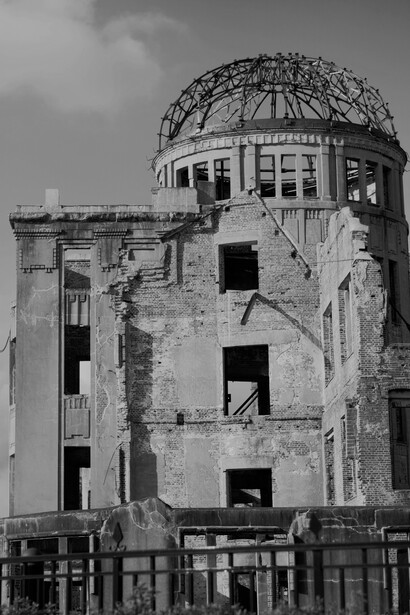 Hiroshima’s Peace Memorial Dome, a symbol of resilience, set against a clear blue sky