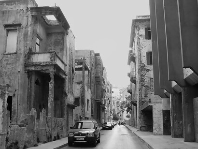 Beirut, Lebanon. Traces of the Lebanese Civil War near the former Green Line, the demarcation line that divided the city between mainly Muslim factions in West Beirut and predominantly Christian communities in East Beirut. The Lebanese Civil War was a complex conflict that lasted from 1975 to 1990