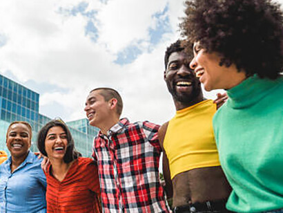 Young people from diverse cultural and religious backgrounds walking together and having fun—celebrating unity in diversity