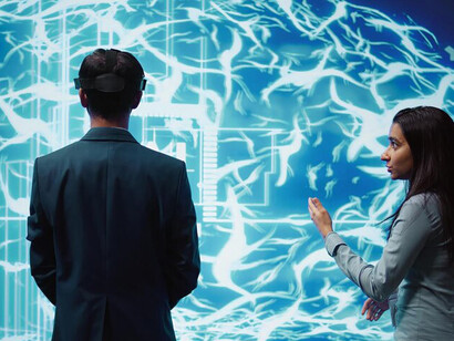 Engineers wearing VR headsets interact with AR holograms, analyzing AI neural networks