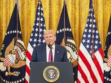 President Donald Trump signs S.1852, The GENIUS Act, Friday, July 18, 2025, in the East Room of the White House